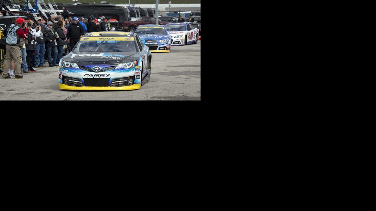 
Cars headed out to the track for practice laps on Friday at Kansas Speedway.
