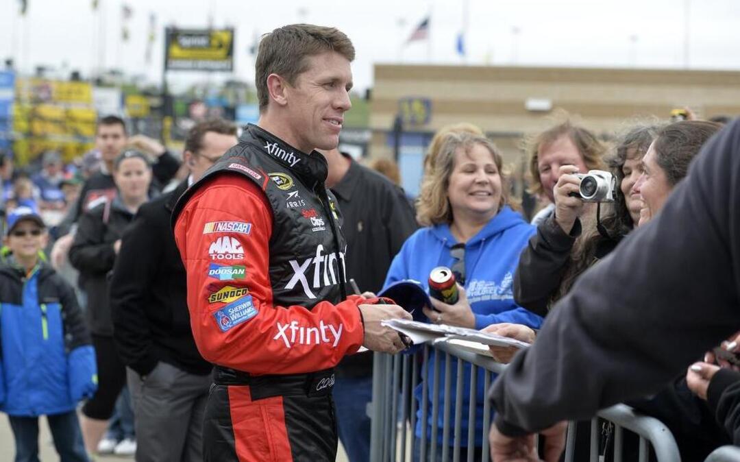 NASCAR Sprint Cup Series driver Carl Edwards signs autographs at the Kansas Speedway Friday, Oct. 14, 2016.