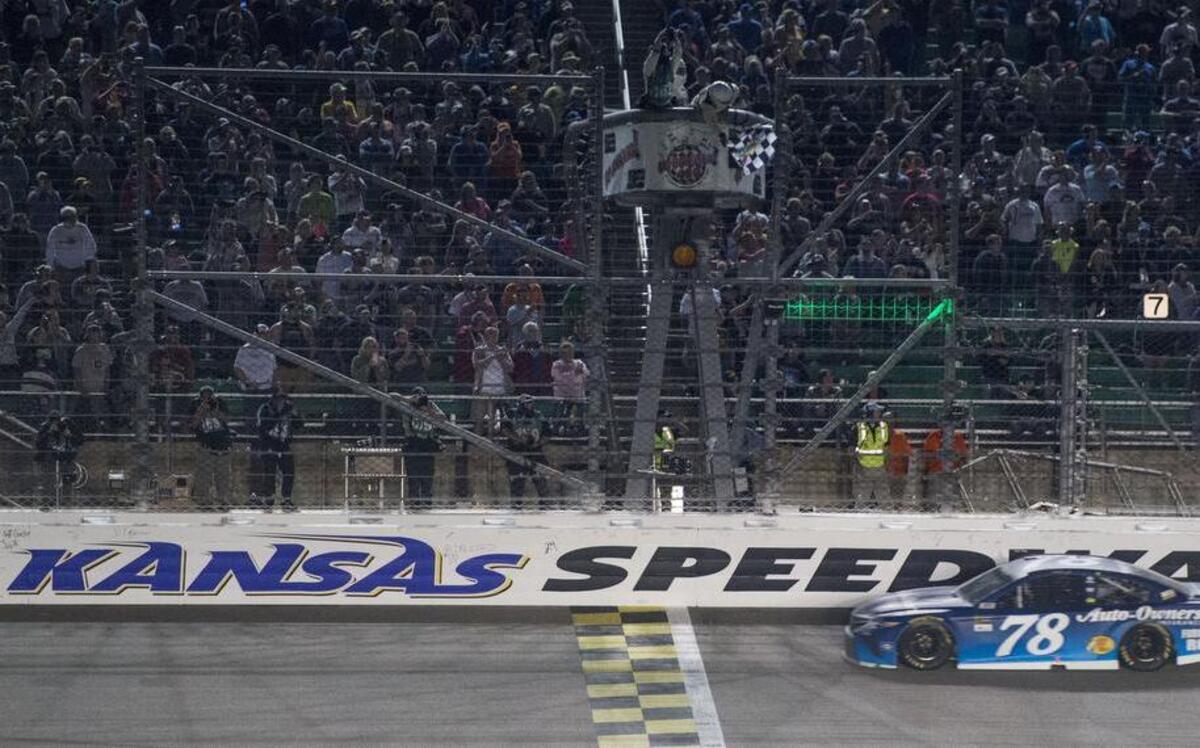 Monster Energy NASCAR Cup Series driver Martin Truex Jr. claimed the checkered flag foir the Go Bowling 400 at Kansas Speedway on Saturday, May 13, 2017, in Kansas City, Kansas.