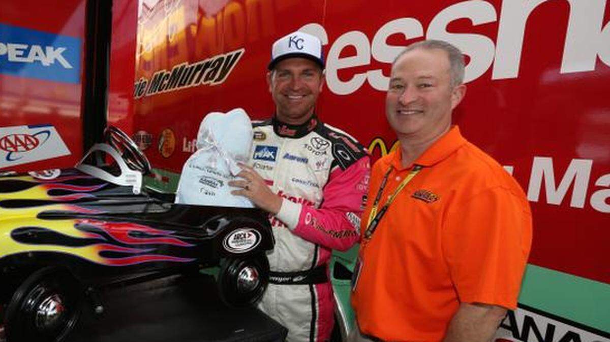 Kansas Speedway president Pat Warren, right, can’t help but pull for Clint Bowyer. Hey, Clint’s a native Kansan, after all.