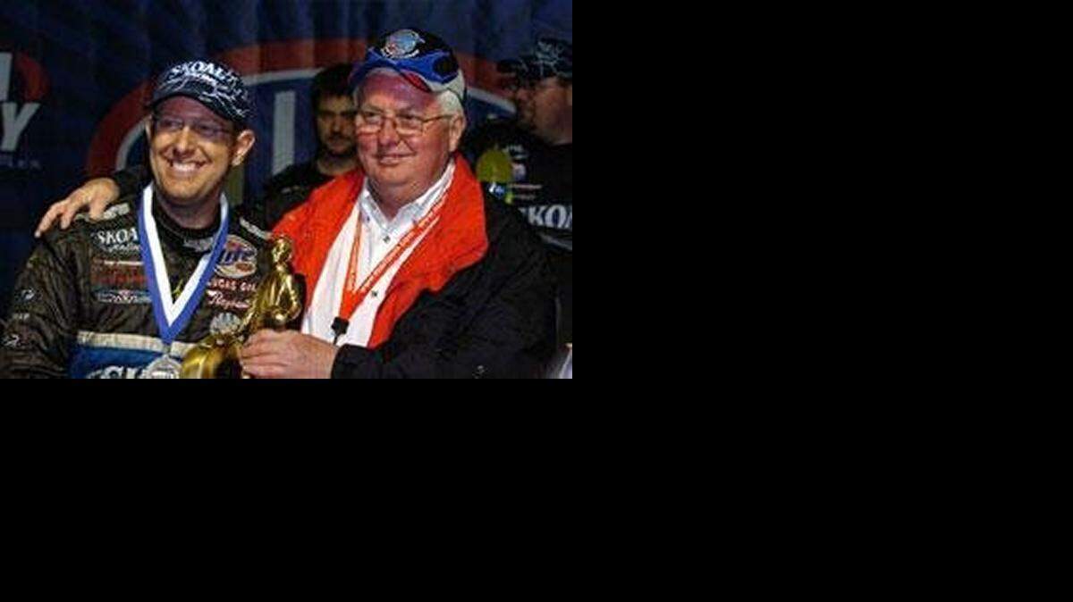 
Tommy Johnson Jr. (left), here with his dad, Tom Johnson Sr., has won in both Top Fuel and Funny Car.
