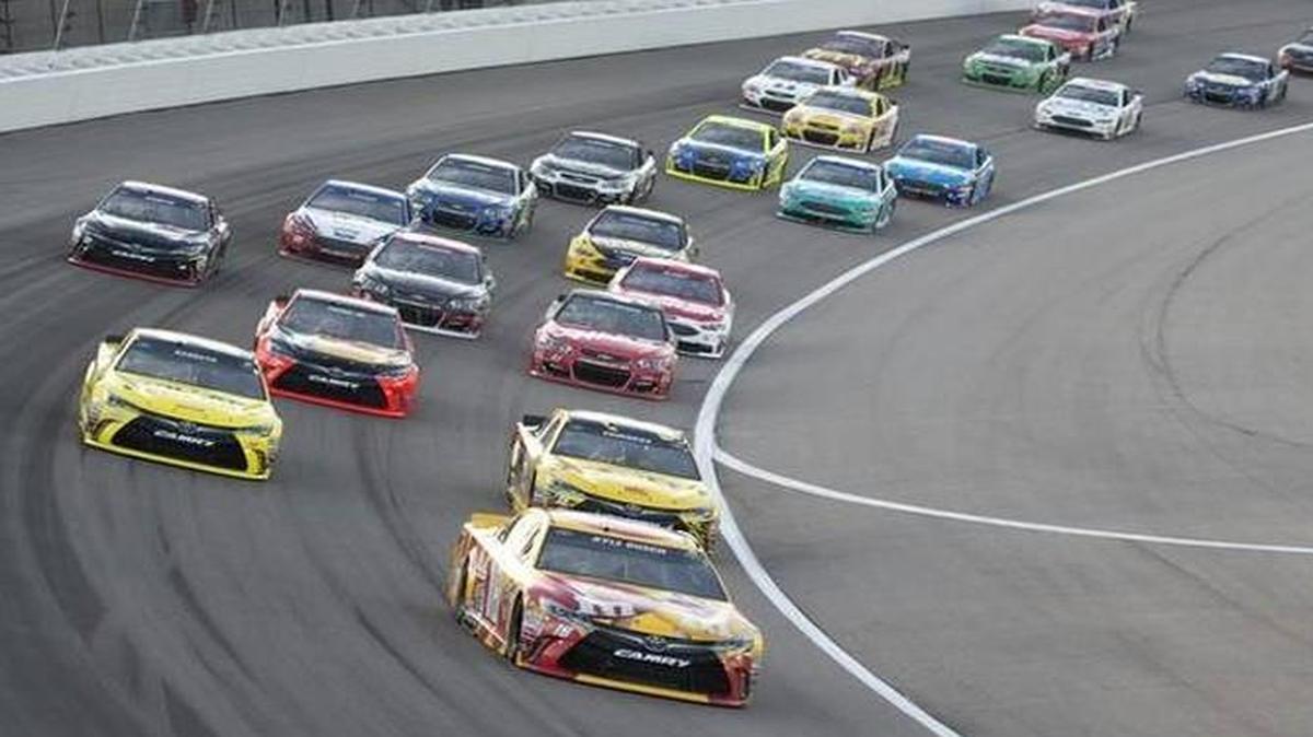 The cars bunched up after a caution at the Go Bowling 400 on Saturday at Kansas Speedway.