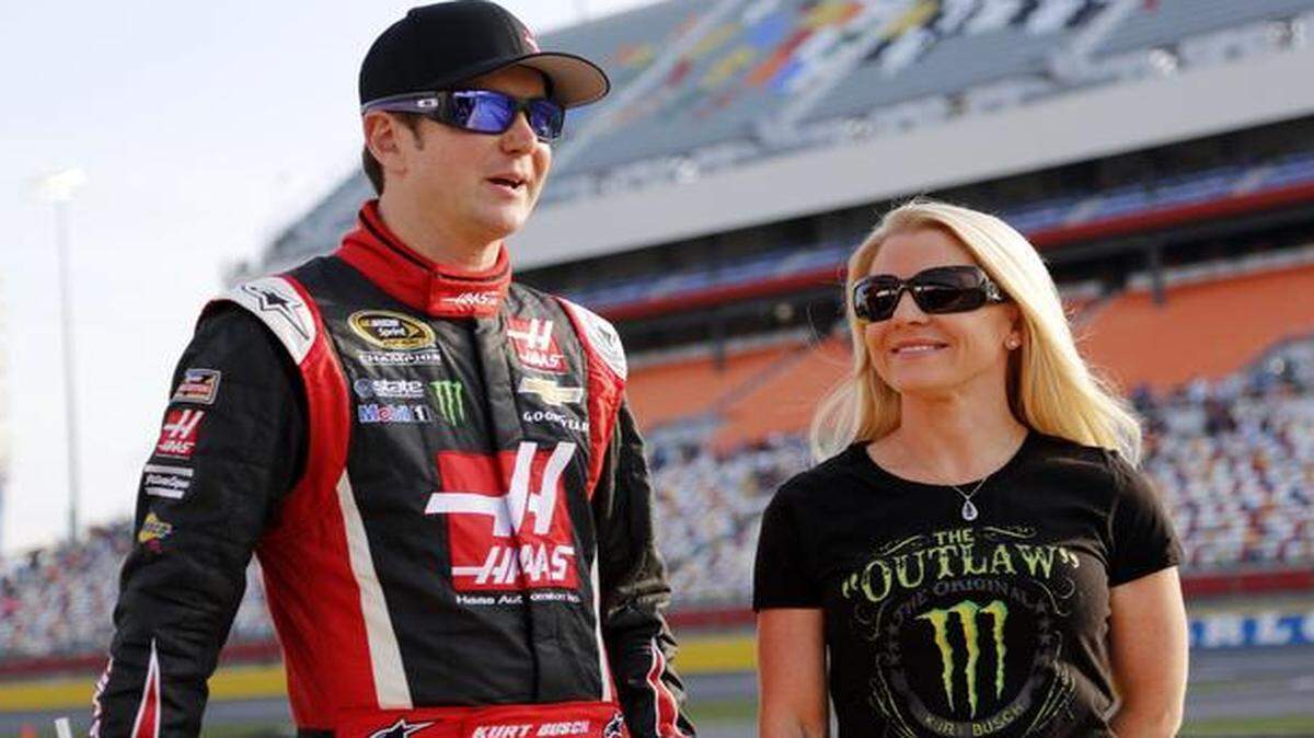 
In this May 22, 2014, file photo, Kurt Busch stands with Patricia Driscoll before qualifying for a NASCAR Sprint Cup series auto race at Charlotte Motor Speedway in Concord, N.C. 
