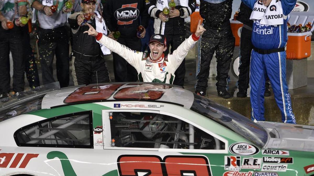 Michael Self of Salt Lake City celebrated in Victory Lane after finishing first in Friday night’s Kansas ARCA 150 at Kansas Speedway.