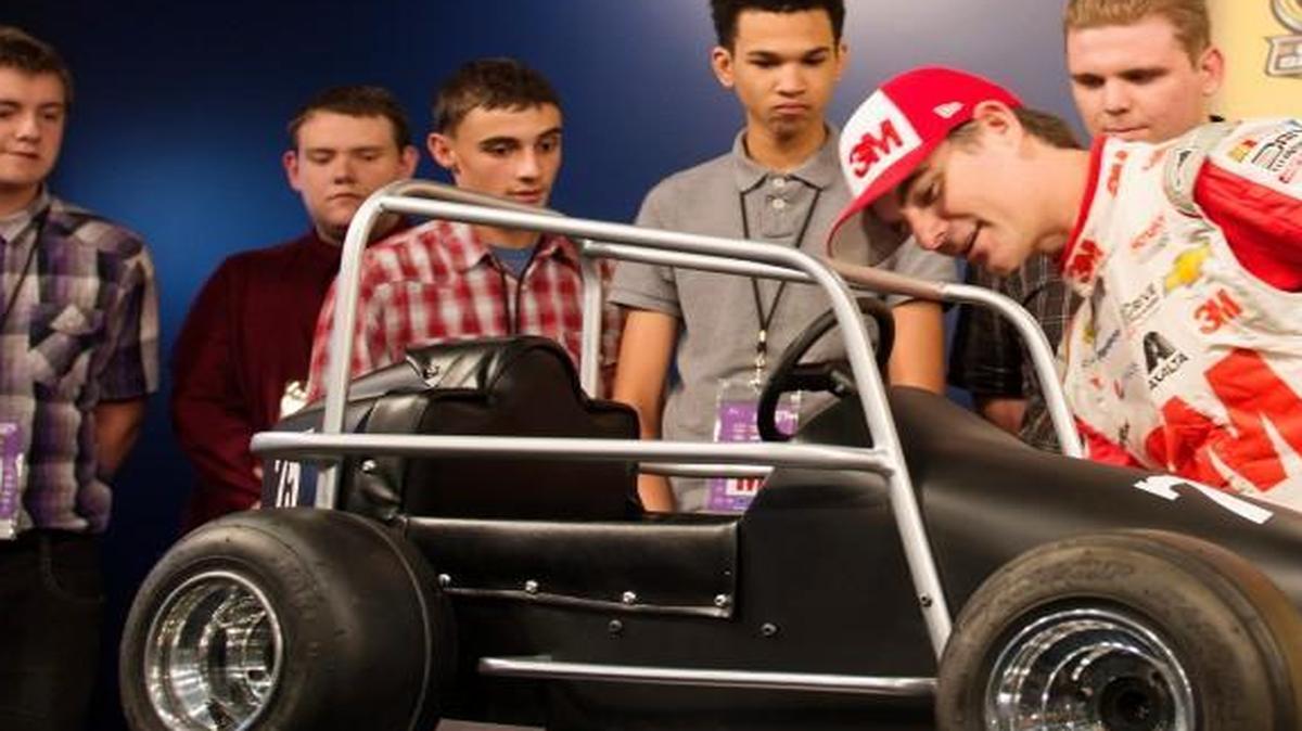 
Students from the North Kansas City Auto Tech school made a replica of Jeff Gordon’s first quarter midget car and presented it to him on Friday at Kansas Speedway.
