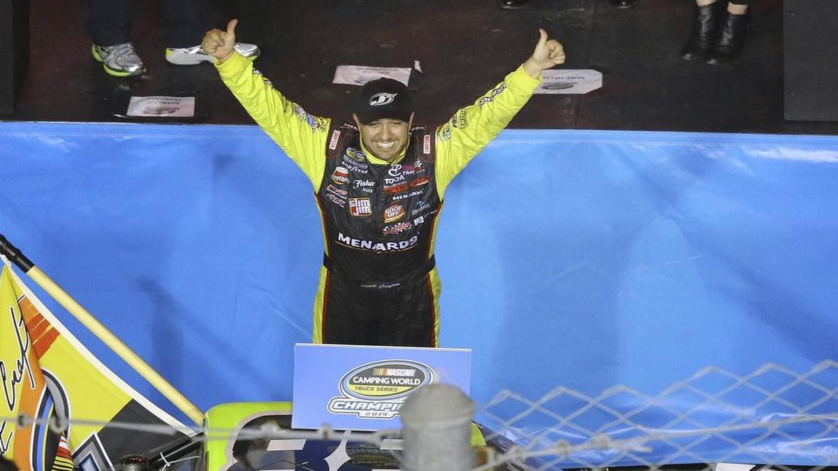 
Matt Crafton celebrated after winning the NASCAR Trucks series season title Friday, Nov. 14, 2014, in Homestead, Fla.
