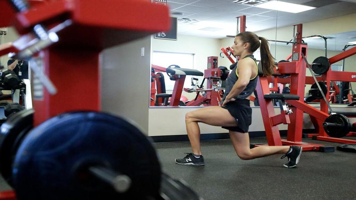 In this Saturday, Feb. 18, 2017, photo, Danica Patrick works out at Daytona International Speedway, in Daytona Beach, Fla. Patrick is really serious about health and clean eating, and as her driving days may be nearing an expiration date, a second career in lifestyle and fitness could be up next.