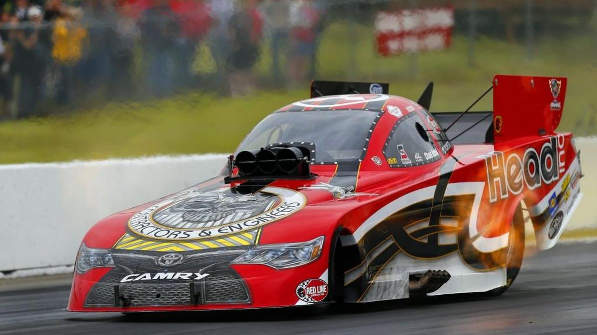 Funny Car driver Chad Head raced down the track at Heartland Park Topeks in May.