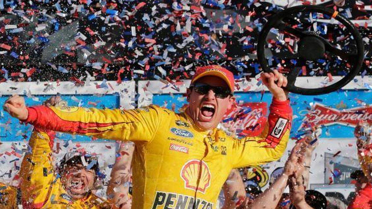 
Joey Logano celebrated in Victory Lane after winning the Daytona 500 NASCAR Sprint Cup series auto race Sunday at Daytona International Speedway in Daytona Beach, Fla.
