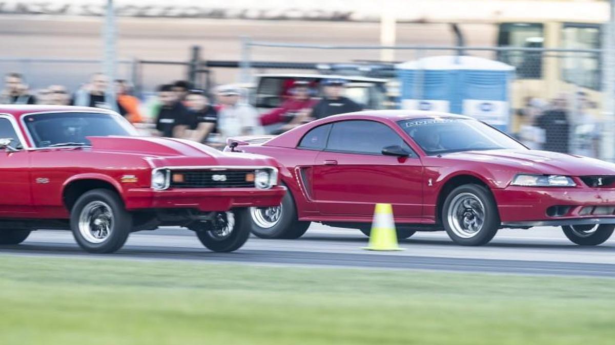 Tyler Van Lant (right) and Andy Asmus drag raced during “Operation Octane” on Saturday at Kansas Speedway.