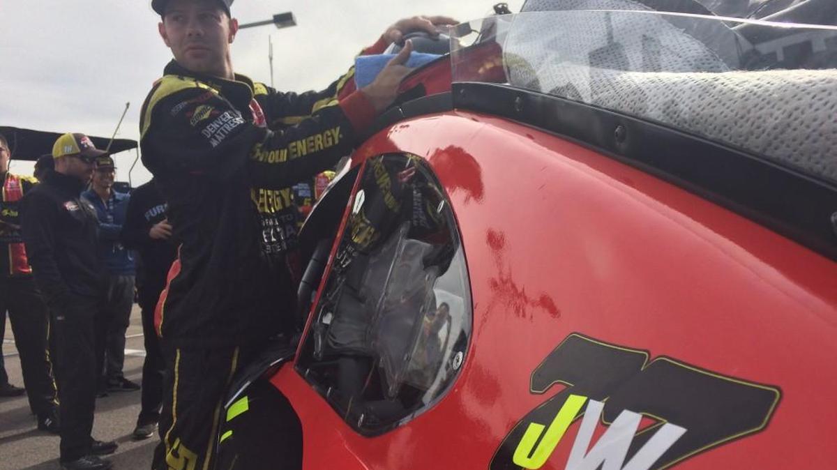 A pit-crew member readies Erik Jones’ car, the No. 77 5-Hour Energy Toyota, before the Hollywood Casino 400 on Sunday, Oct. 22, 2017, at Kansas Speedway. The “JW” decal honors Furniture Row Racing crew member Jim Watson, who died of a heart attack Saturday night after a go-kart outing in Raytown.