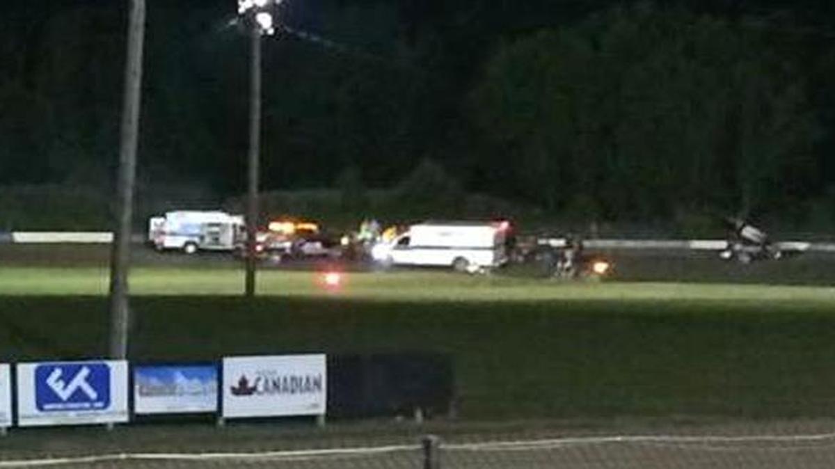 
This image provided by Logan Messerly shows ambulances on the scene at Canandaigua Motorsports Park on Saturday Aug. 9, 2014 in Canandaigua, N.Y. 
