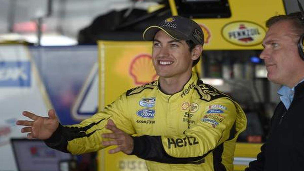 
Joey Logano (left) received a four-year contract extension from Team Penske.
