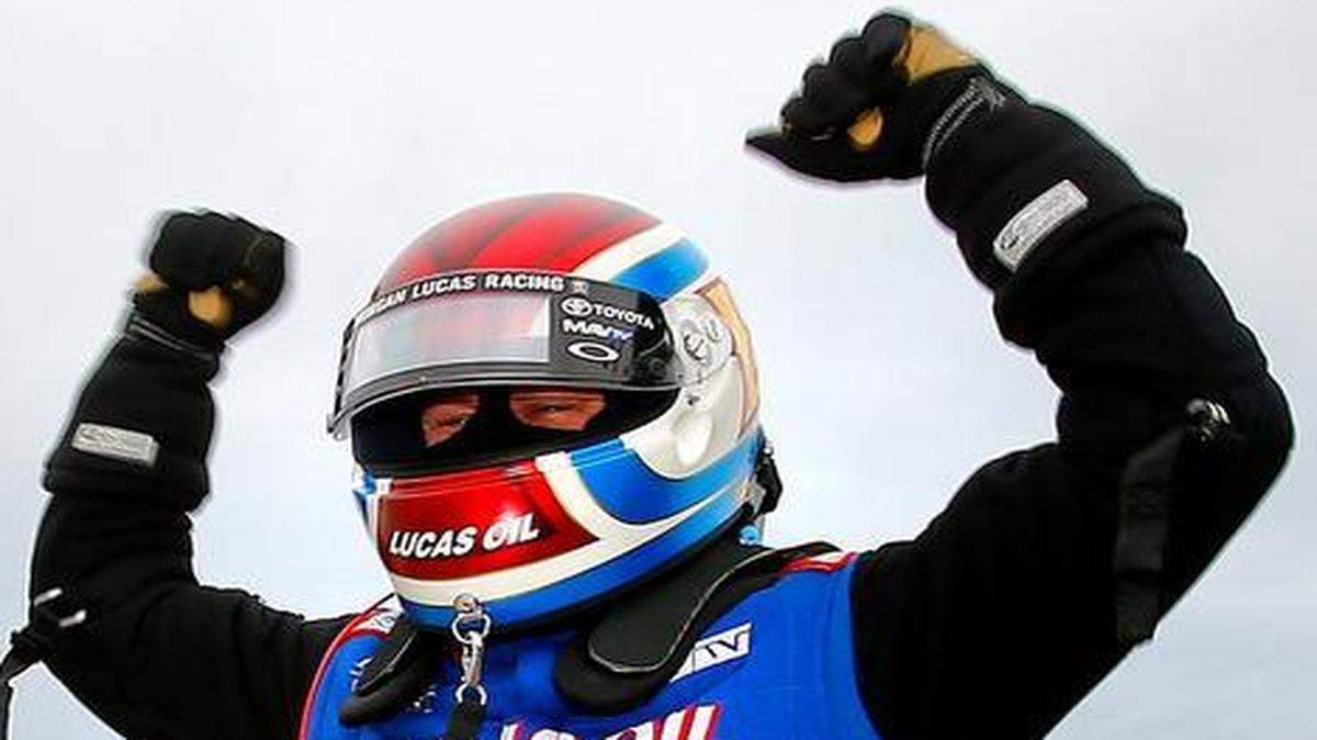 
Top Fuel driver Richie Crampton celebrated in his dragster after winning the title Sunday at the NHRA Kansas Nationals at Heartland Park Topeka.

