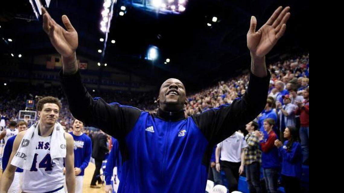
KU's Cliff Alexander (right) celebrated the Jayhawks' Feb. 28 win over Texas with teammate Brannen Grenne (14). Alexander, who did not suit up for that game because of eligibility issues, wasn't picked in Thursday's NBA Draft
