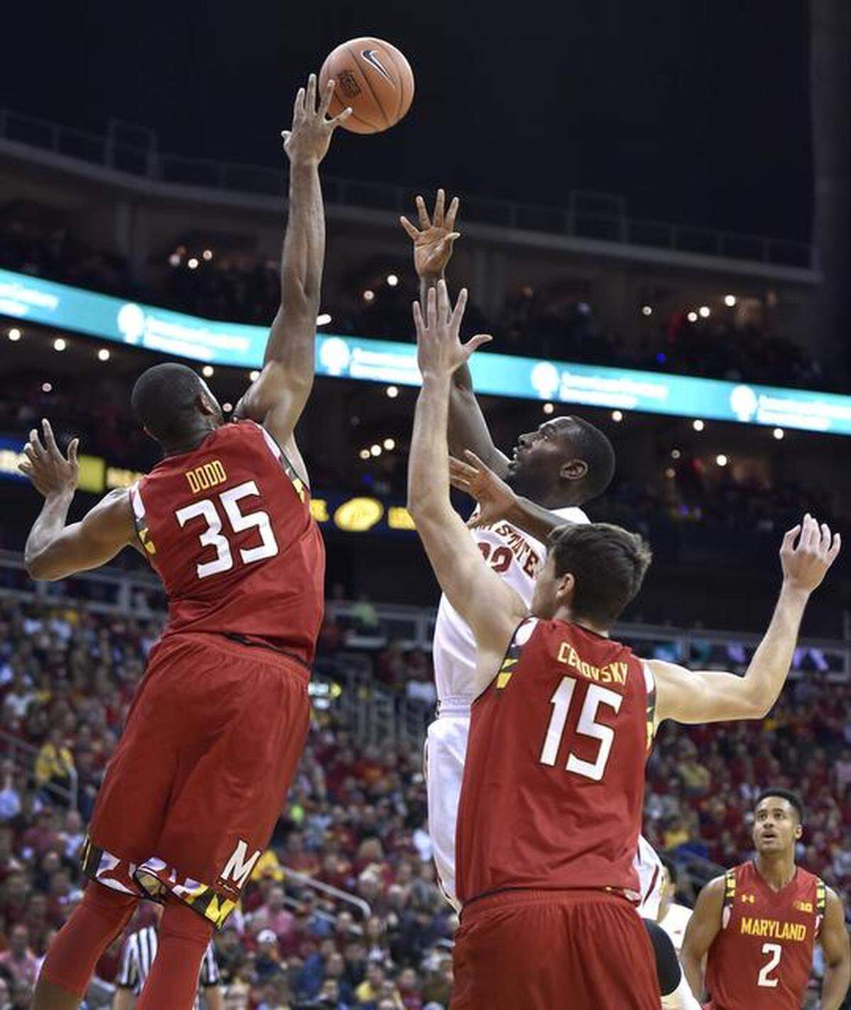 Maryland’s Damonte Dodd (35) swats down a shot by ISU’s Dustin Hogue during the first half of Tuesday night’s CBE Hall Of Fame Classic, being played at the Sprint Center.