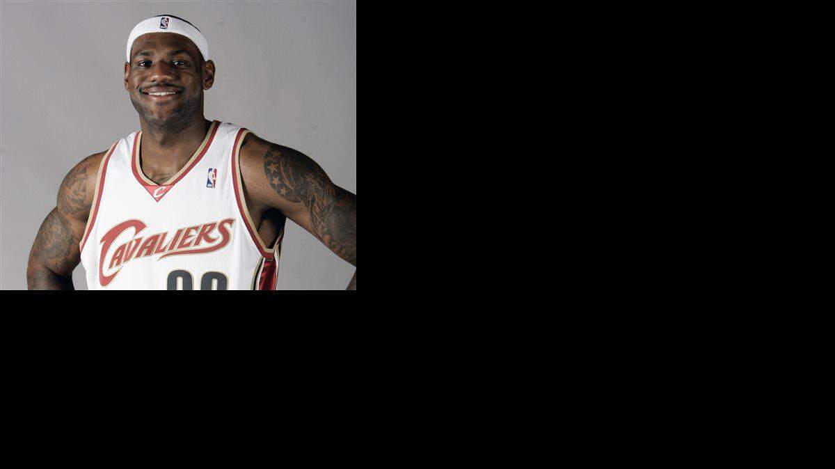 FILE - This Sept. 29, 2008 file photo shows then-Cleveland Cavaliers' LeBron James at the team's media day in Independence, Ohio. A person familiar with the deals says the Cavaliers have agreed to trade guard Jarrett Jack, swingman Sergey Karasev and center Tyler Zeller, moves that can help their pursuit of LeBron James by clearing salary cap space. The Cavs have agreements with the Brooklyn Nets and Boston Celtics, according to the person who spoke Wednesday, July 9, 2014, to The Associated Press. The person spoke on condition of anonymity because teams are not permitted to discuss any trades until the league's moratorium ends Thursday.