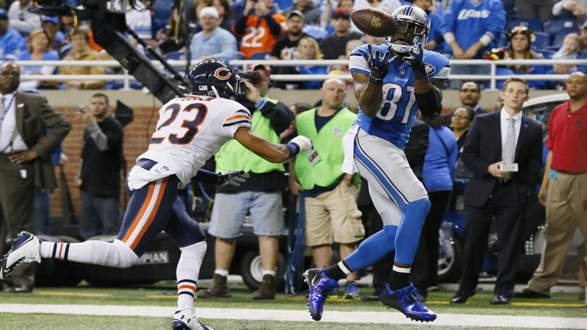 Detroit Lions wide receiver Calvin Johnson (right) retired from the NFL on Tuesday.