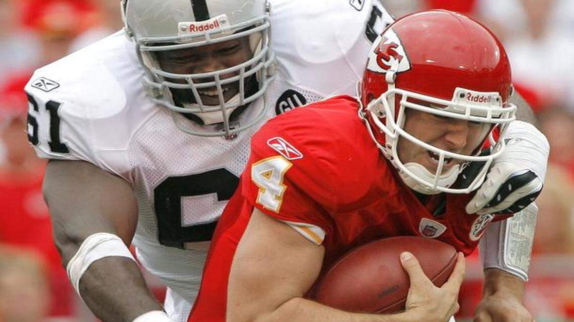 
Oakland Raiders defensive tackle Gerard Warren sacked Kansas City Chiefs quarterback Tyler Thigpen on Sept. 14, 2008, at Arrowhead Stadium.
