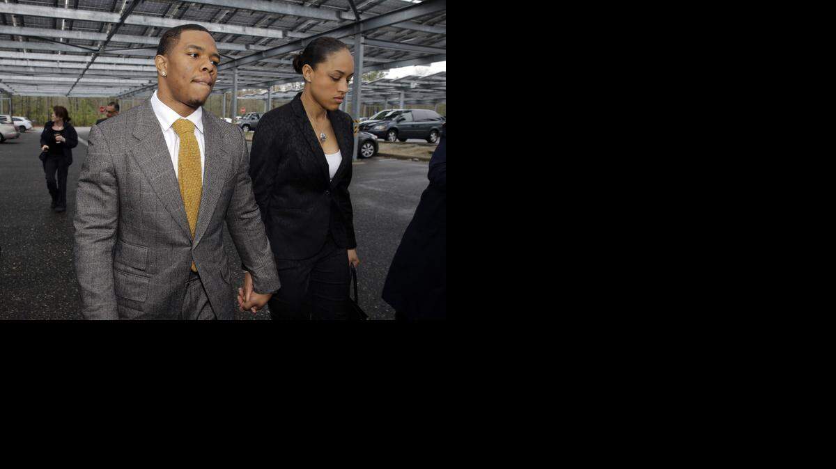 
In this May 1, 2014, file photo, Baltimore Ravens football player Ray Rice held hands with his wife, Janay Palmer, as they arrived at Atlantic County Criminal Courthouse in Mays Landing, N.J. 
