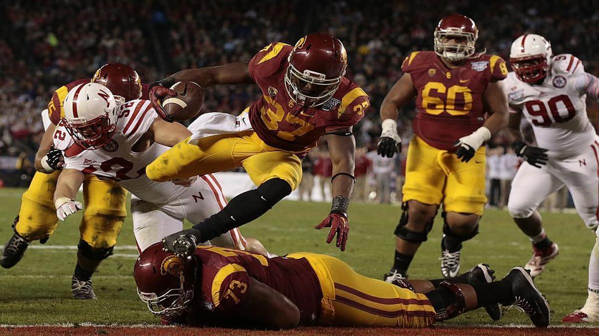 
Southern California running back Javorius Allen leaped into the end zone for a second-quarter touchdown against Nebraska during the 2014 Holiday Bowl.
