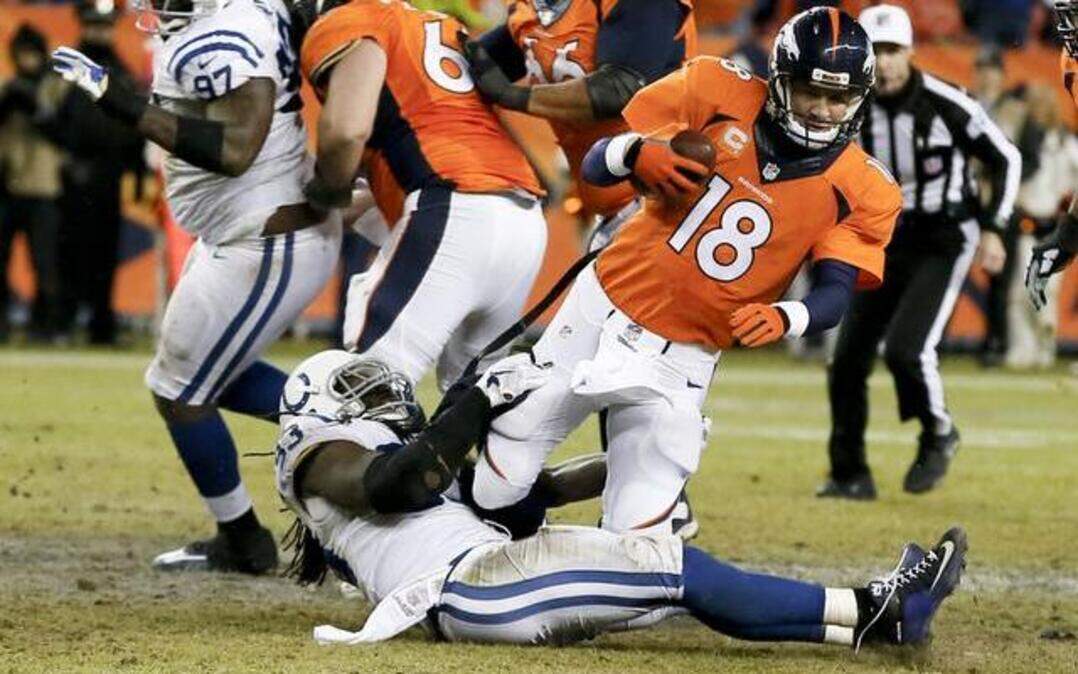 
Denver Broncos quarterback Peyton Manning was sacked by Indianapolis Colts outside linebacker Erik Walden during the second half of Sunday’s AFC Divisional game, which the Colts won 24-13.


