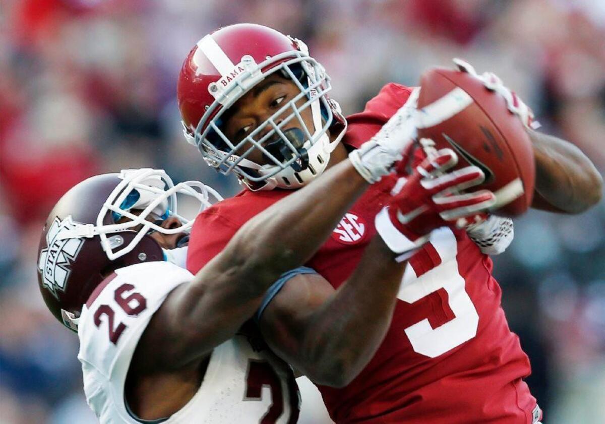 Amari Cooper caught 124 passes for 1,727 yards and 16 touchdowns last season for Alabama.