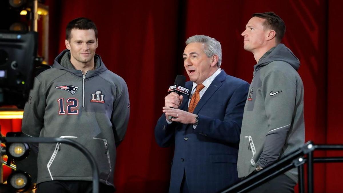 New England’s Tom Brady and Atlanta’s Matt Ryan are interviewed during opening night for the NFL Super Bowl 51 football game at Minute Maid Park on Monday, Jan. 30, 2017, in Houston.