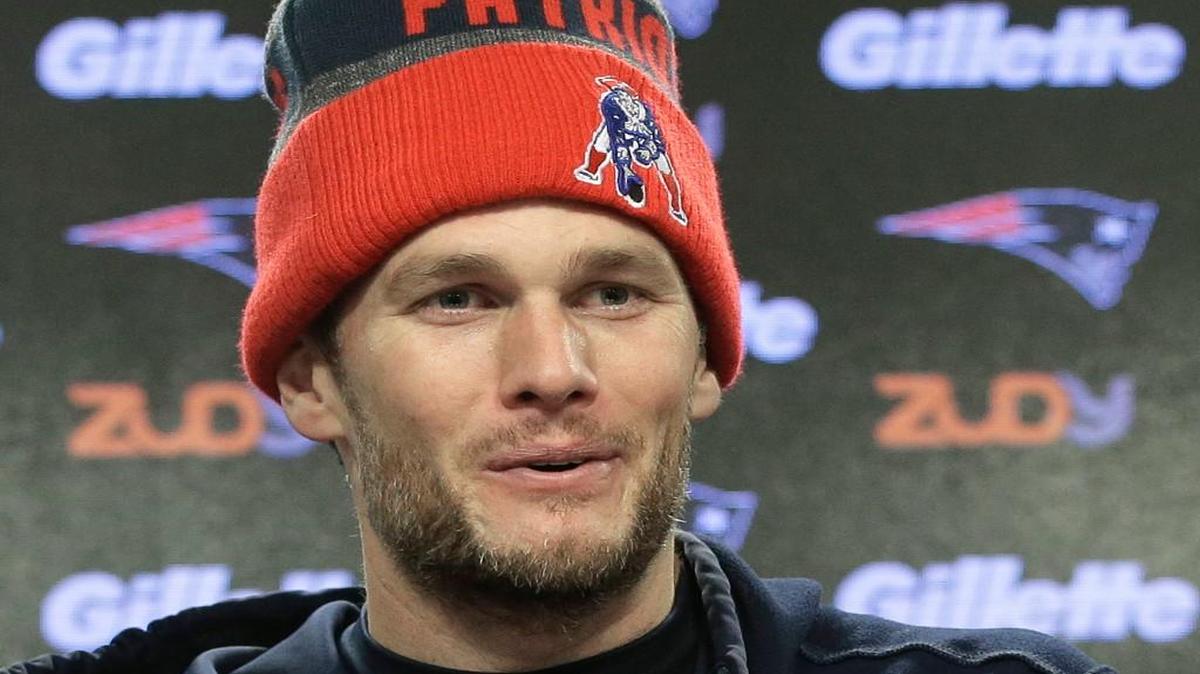 New England Patriots quarterback Tom Brady faces reporters following practice on Thursday in Foxborough, Mass.