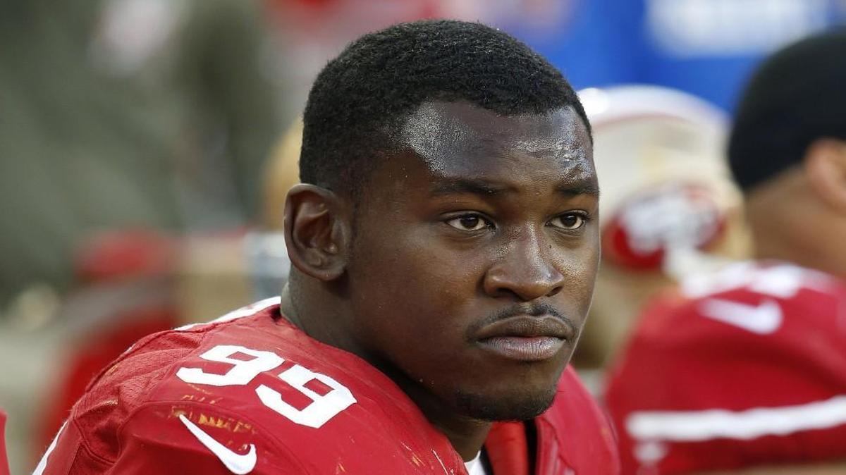 
In this Nov. 23, 2014 file photo, Aldon Smith sat on the bench during a 49ers game.
