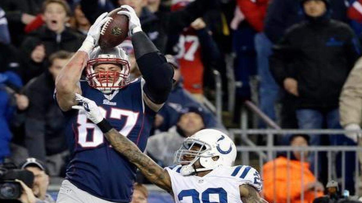
Patriots tight end Rob Gronkowski (left) has always been a big load to handle for NFL defensive backs, and this year is no exception.


