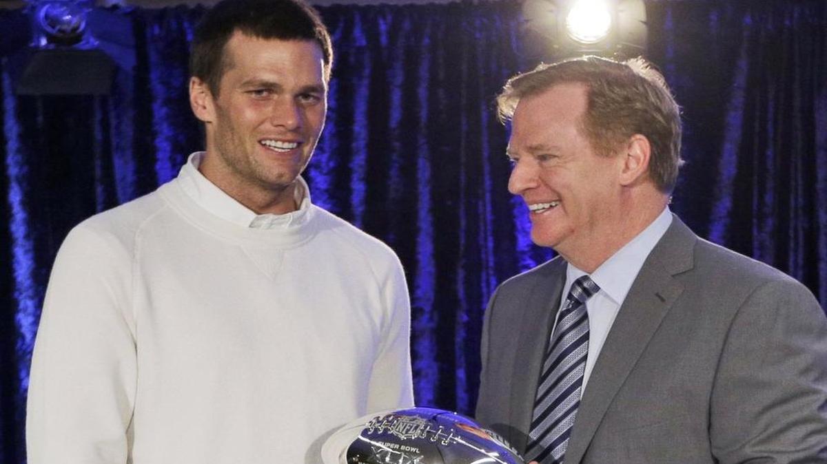 
In this Feb. 2, 2015 file photo, New England Patriots quarterback Tom Brady posed with NFL Commissioner Rodger Goodell during a news conference after Super Bowl XLIX.
