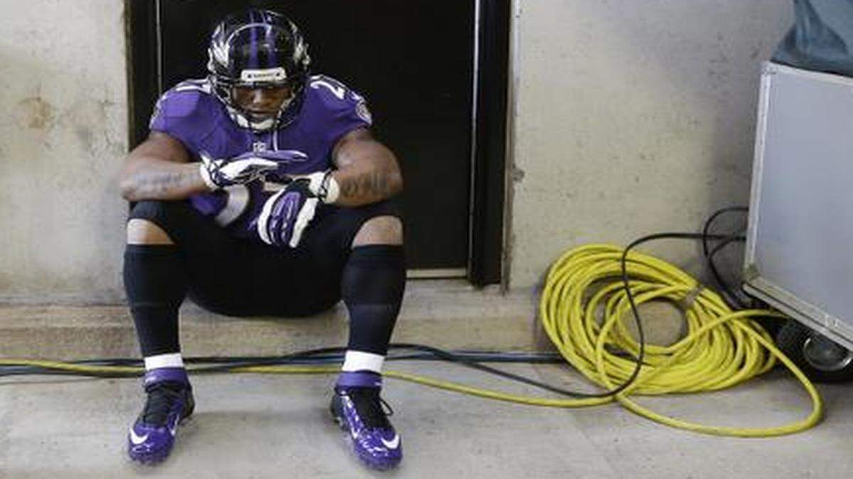 
In this Nov. 10, 2013, file photo, Baltimore Ravens running back Ray Rice waited on the tunnel for his introduction before an NFL football game against the Cincinnati Bengals in Baltimore. It’s an NFL fact of life: If a player has talent, a team can find a place for him, no matter how bad his off-the-field profile. Ray Rice is testing that maxim, as much for his deed as the fact that it's documented on video. He’s suspended now, but can he rehab his image enough to come back on the field?

