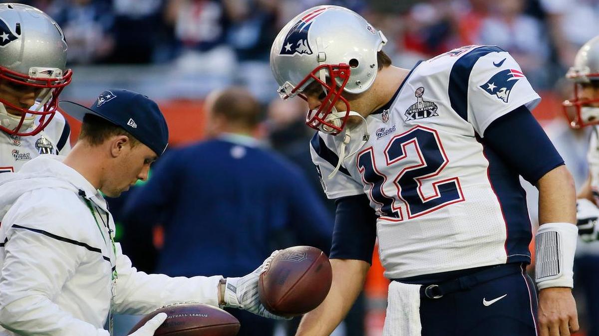
FILE - In this Feb. 1, 2015, file photo, New England Patriots quarterback Tom Brady (12) warmed up before Super Bowl XLIX against the Seattle Seahawks in Glendale, Ariz. 
