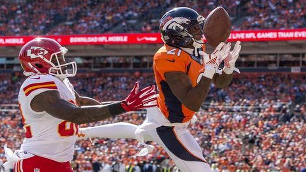 
Denver Broncos cornerback Aqib Talib bobbled and then dropped the football in the end zone behind intended receiver Kansas City Chiefs wide receiver Dwayne Bowe (82) in NFL action on September 14, 2014 at Sports Authority Field at Mile High in Denver, Colo.
