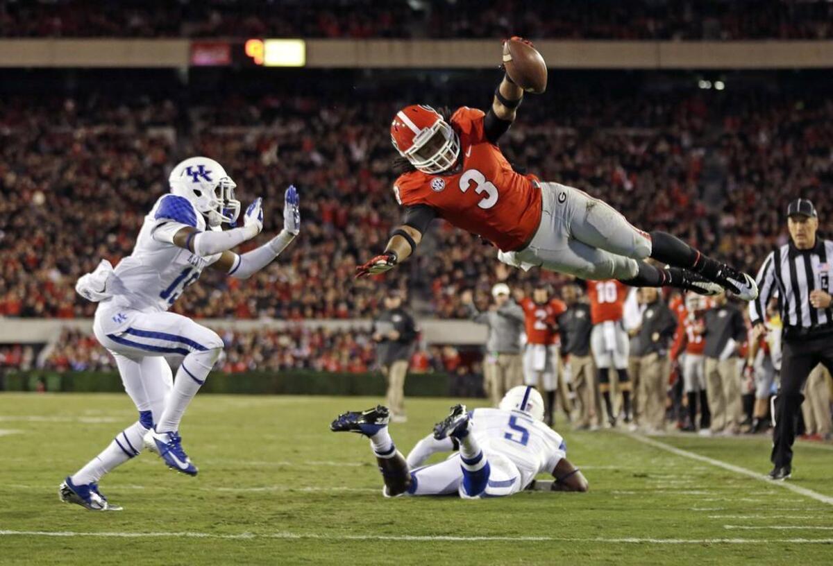 Georgia running back Todd Gurley (3) leaped into the end zone for a touchdown against Kentucky last season