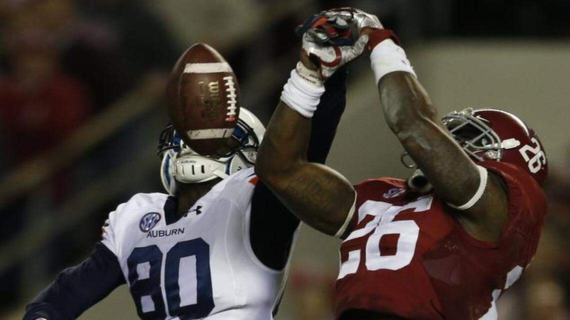 
Alabama defensive back Landon Collins (right) broke up a pass intended for Auburn wide receiver Marcus Davis during a game in November.
