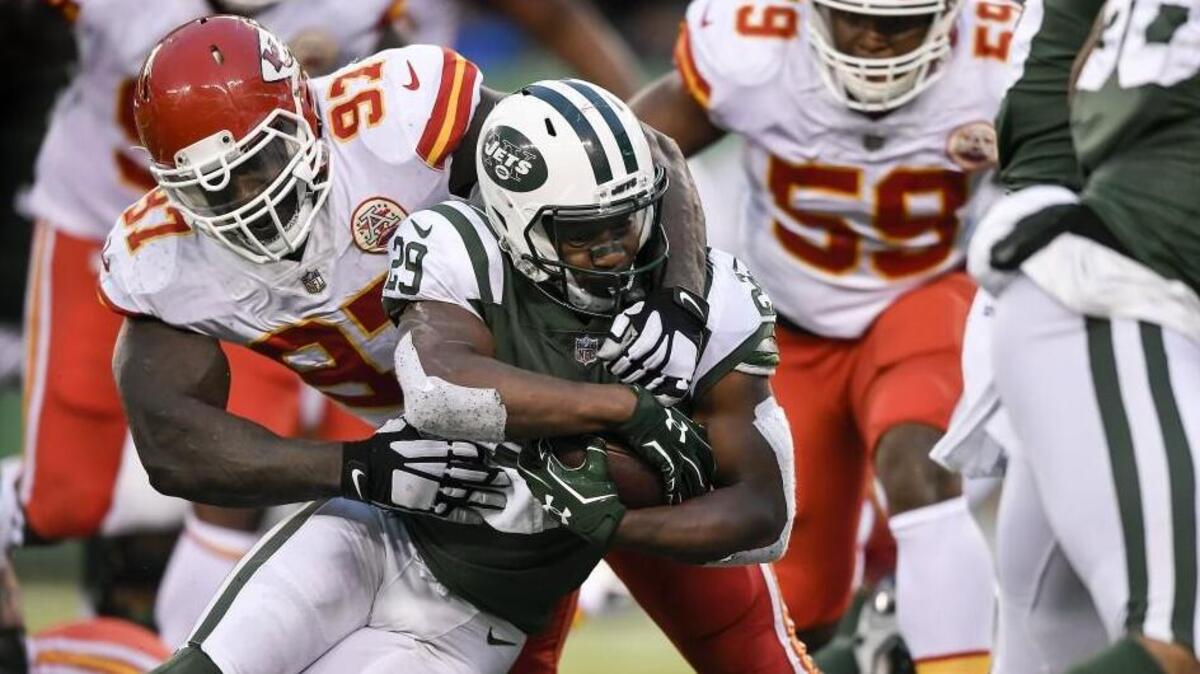 Chiefs defensive end Allen Bailey, left, kept New York Jets running back Bilal Powell from scoring at the goal line on Sunday.