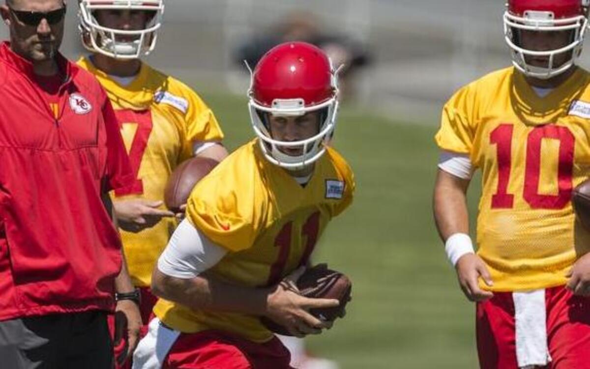 
Kansas City Chiefs quarterback Alex Smith (11) worked on his technique at the beginning of organized team activities (OTAs) at the Arrowhead Stadium practice facility in early June.
