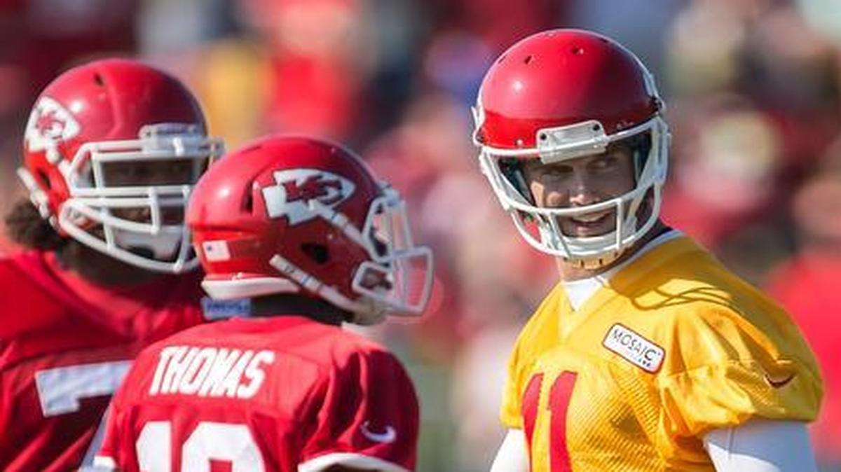 
After seven months of running, lifting and studying, the Chiefs finally will get back to real football Monday. The first day in pads will help the offense, led by quarterback Alex Smith (11), in many ways.

