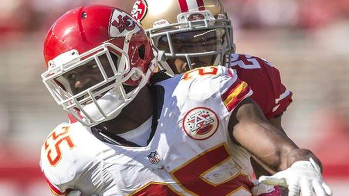 
Kansas City Chiefs running back Jamaal Charles (25) was tackled by San Francisco 49ers cornerback Chris Culliver (29) in the second quarter in NFL action on October 5, 2014 at Levi's Stadium in Santa Clara, Calif. The 49ers won, 22-17.

