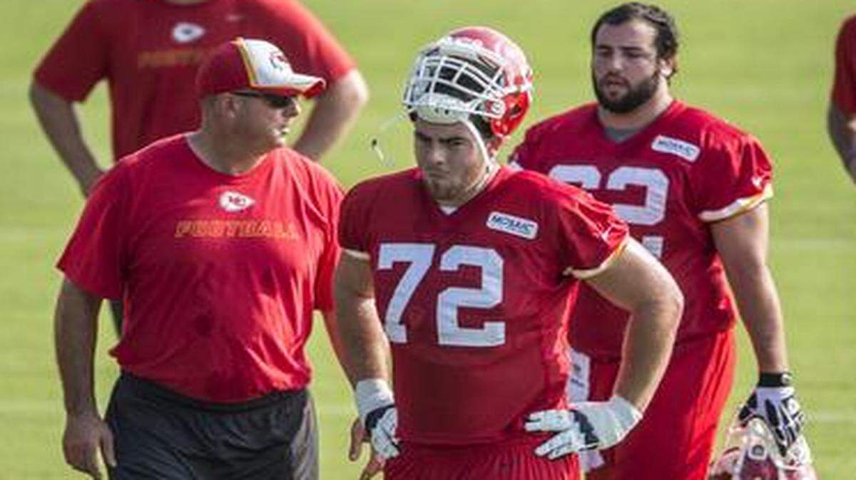 
Kansas City Chiefs offensive tackle Eric Fisher (72) walked with his offensive line teammates on Tuesday morning during Kansas City Chiefs summer training camp practice at Missouri Western State University in St. Joseph, Mo.
