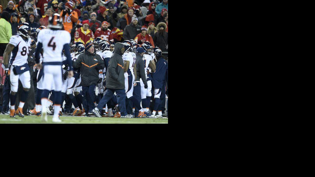 
The Broncos ran a fake punt along the sideline in the second quarter during the Kansas City Chiefs and Denver Broncos football game at Arrowhead Stadium on Sunday, November 30, 2014, in Kansas City, Mo..
