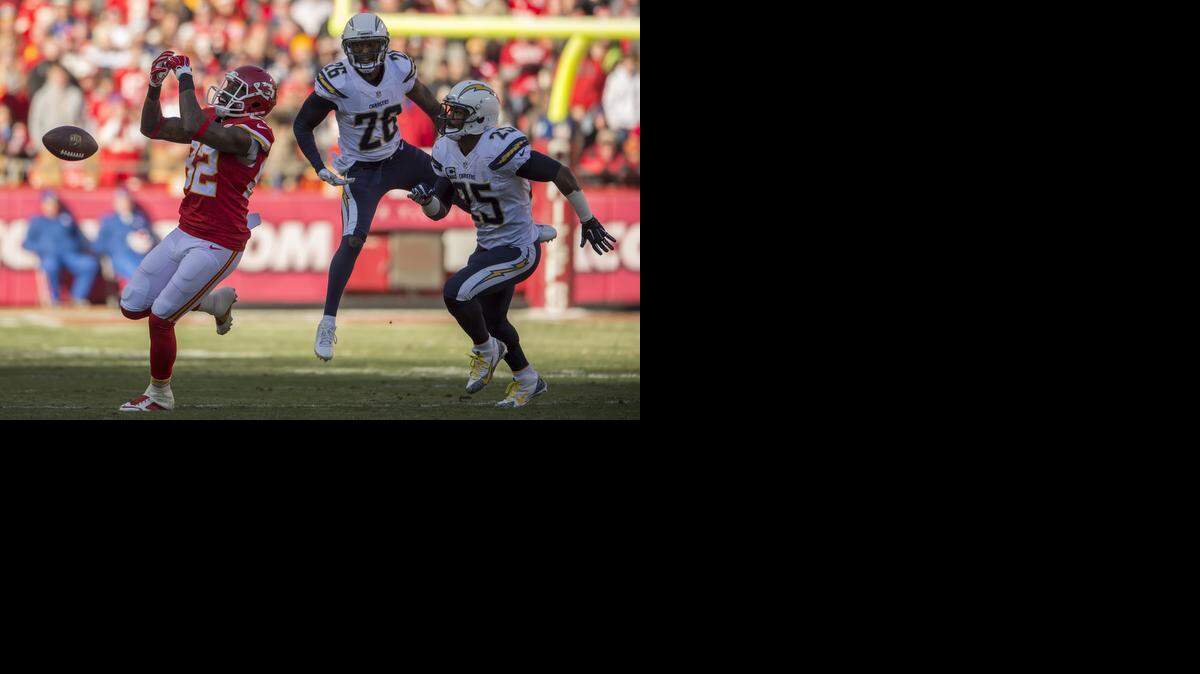 
Kansas City Chiefs wide receiver Dwayne Bowe (82) dropped a second quarter pass, defended by San Diego Chargers cornerback Brandon Flowers (26) and Darrell Stuckey (25) in NFL action on December 28, 2014 at Arrowhead Stadium in Kansas City, Mo. The Chiefs won 19-7.
