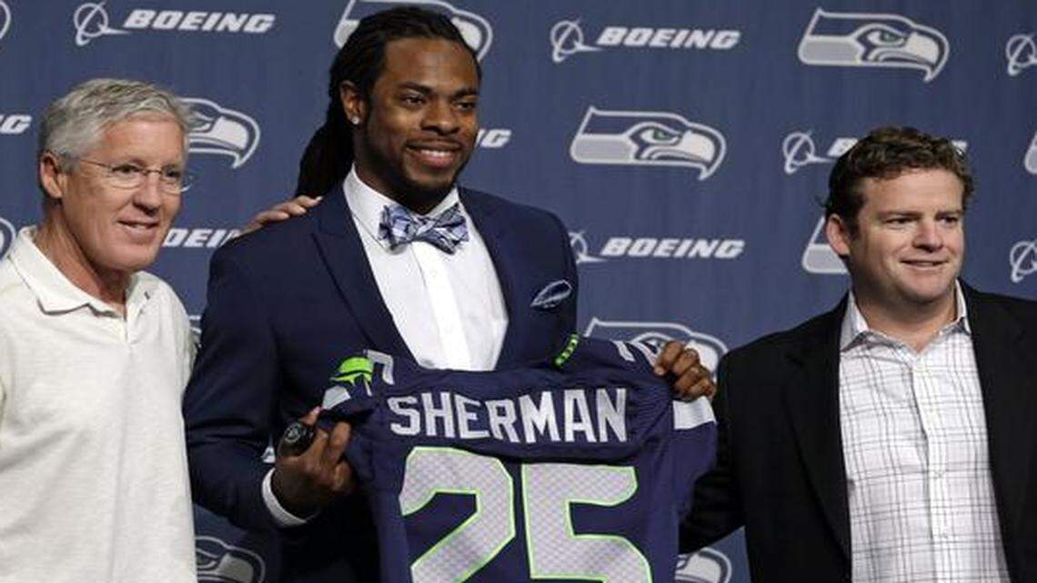 
Seattle Seahawks general manager John Schneider (right), who who posed with coach Pete Carroll (left) and cornerback Richard Sherman earlier this year, spent three years as the Chiefs’ director of pro personnel.
