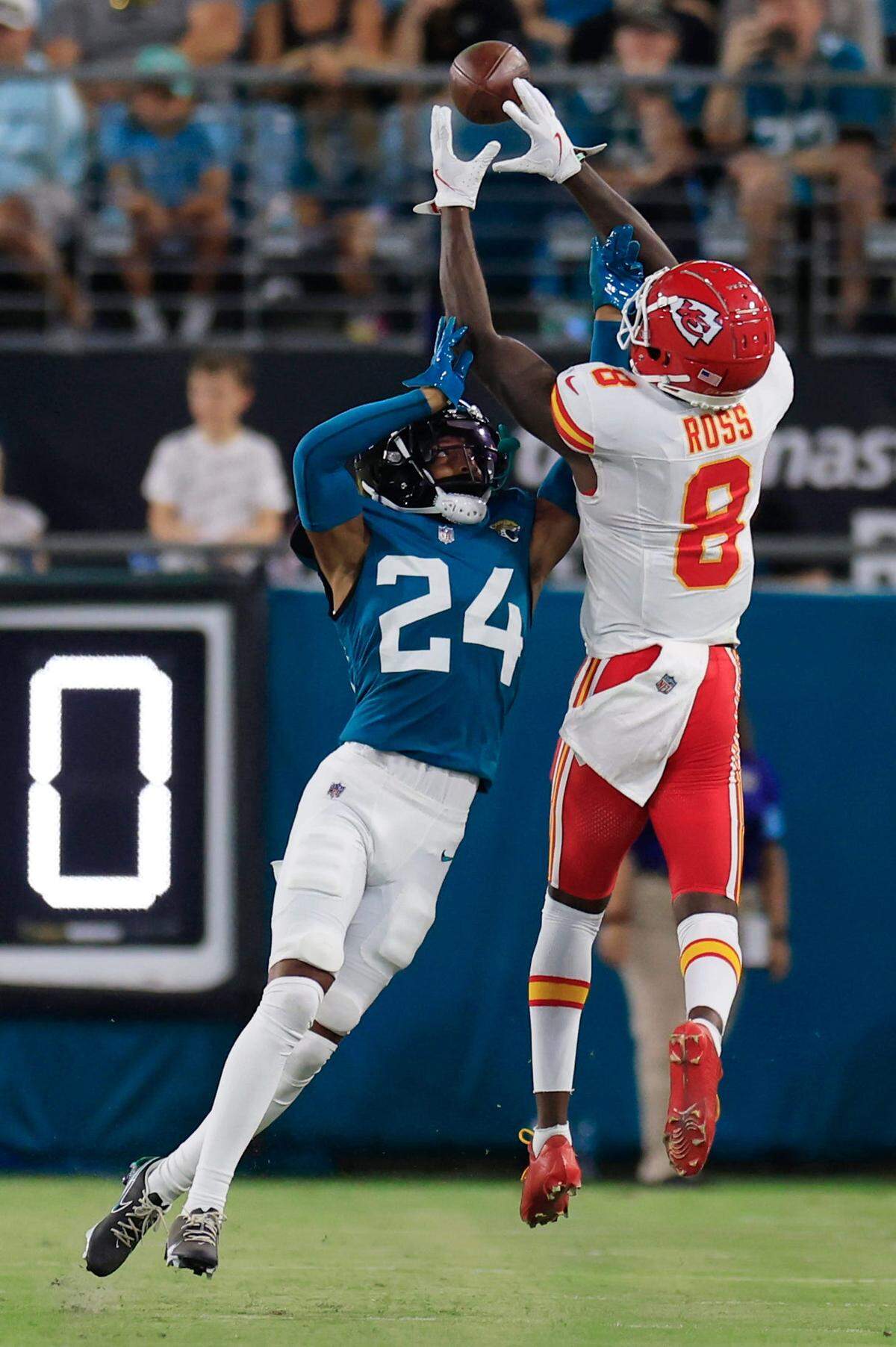 Kansas City Chiefs wide receiver Justyn Ross (8) hauls in a reception against Jacksonville Jaguars cornerback De’Antre Prince (24) during the third quarter of a preseason NFL football game Saturday, Aug. 10, 2024 at EverBank Stadium in Jacksonville, Fla. The Jacksonville Jaguars defeated the Kansas City Chiefs, 26-13.