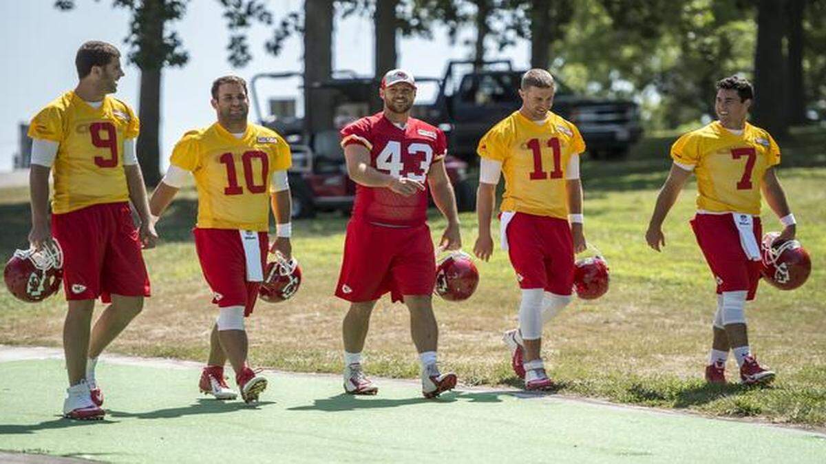
Kansas City Chiefs quarterbacks, from left in yellow, Tyler Bray, Chase Daniel, Alex Smith and Aaron Murray 
