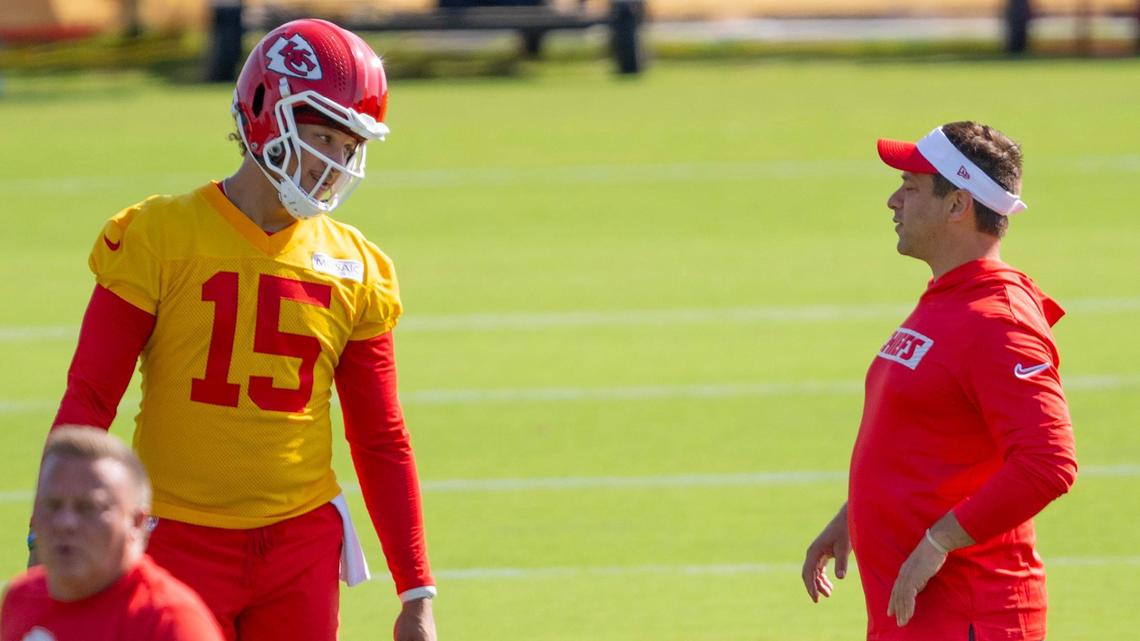 Kansas City Chiefs quarterback Patrick Mahomes (15) speaks with general manager Brett Veach during practice at Chiefs training camp on Wednesday, July 17, 2024, in St. Joseph.