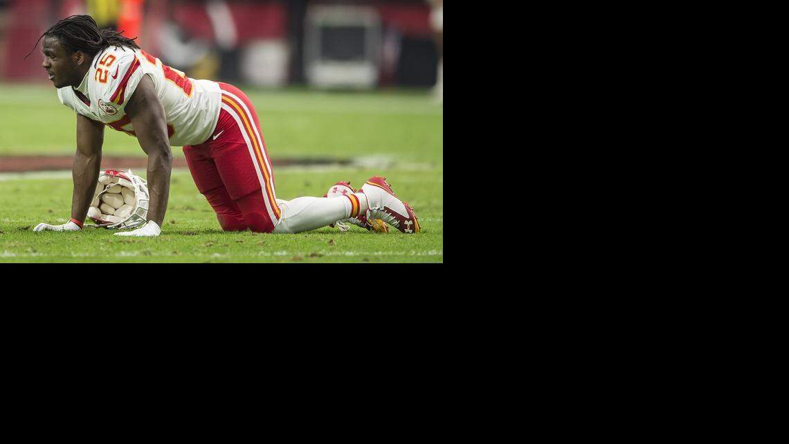 
Kansas City Chiefs running back Jamaal Charles (25) collapsed on the field after an injury in the first quarter against the Arizona Cardinals in NFL action on December 7, 2014 at University of Phoenix Stadium in Glendale, AZ.
