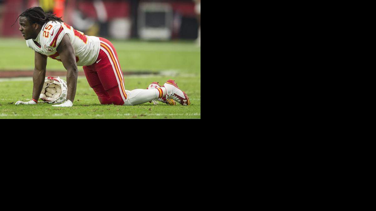 
Kansas City Chiefs running back Jamaal Charles (25) collapsed on the field after an injury in the first quarter against the Arizona Cardinals in NFL action on December 7, 2014 at University of Phoenix Stadium in Glendale, AZ.
